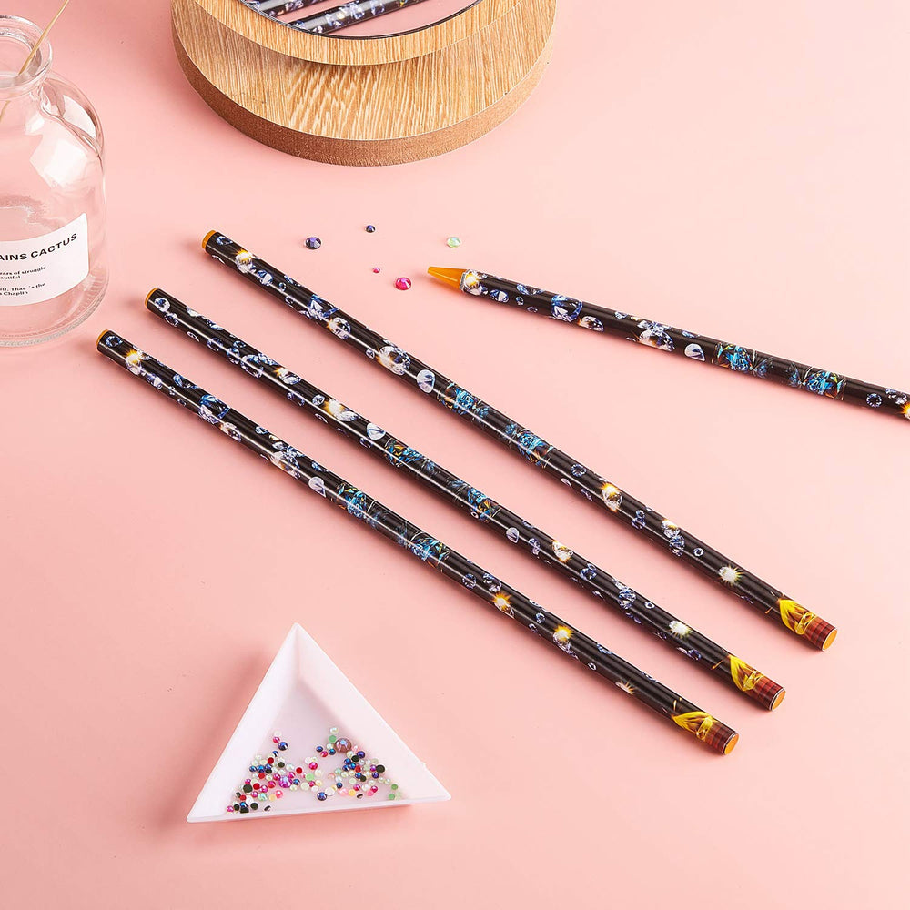 Blulu pencil placing rhinestone on nail for cleaner, faster work
