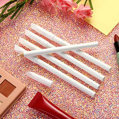 Blulu pencils next to finger showing compact size for travel convenience