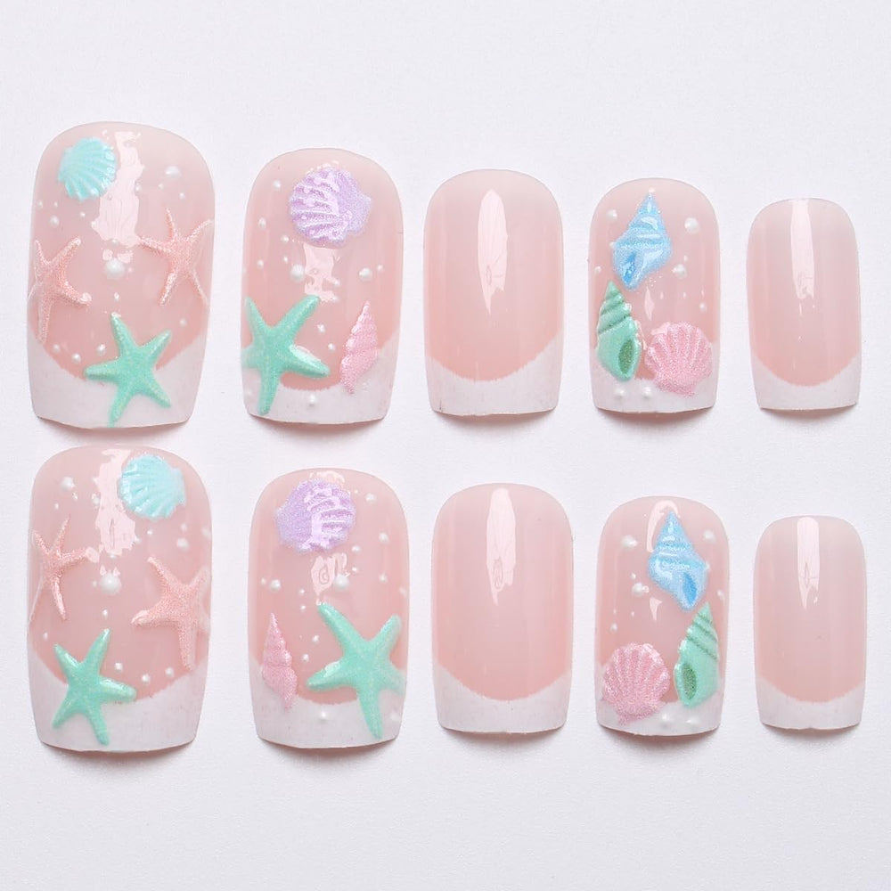 BMKKOT hand applying a press-on nail demonstrating quick glue-on application and neat finish