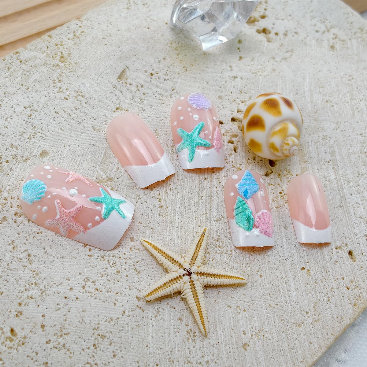 BMKKOT full set laid out with 24 nails, jelly stickers, file and wooden stick for easy at-home manicure