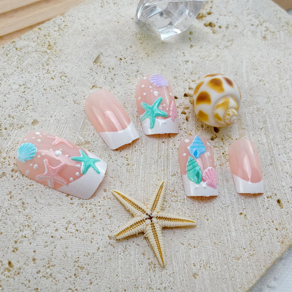 BMKKOT full set laid out with 24 nails, jelly stickers, file and wooden stick for easy at-home manicure