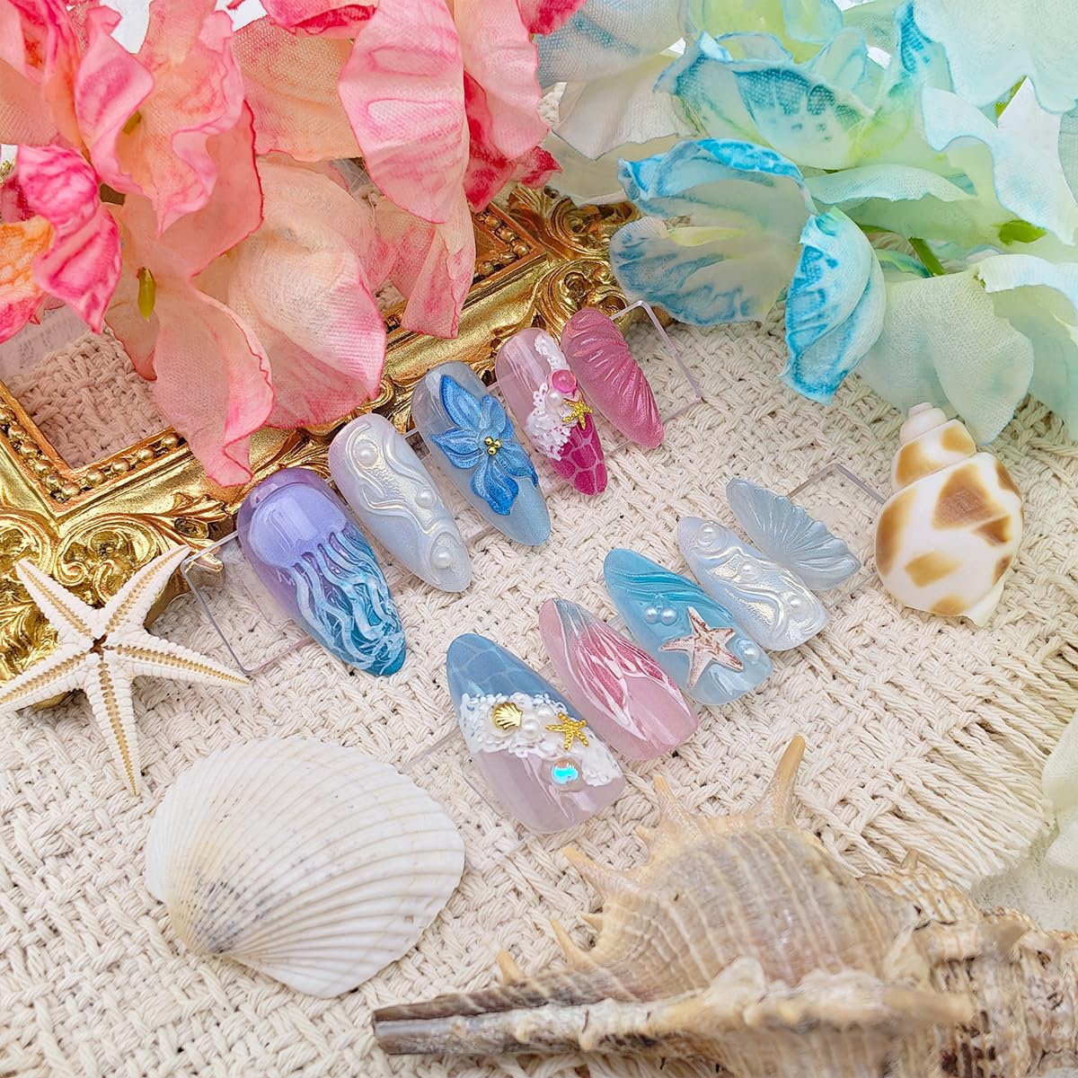 BMKKOT single nail with seashell accent demonstrating delicate seaside ornamentation