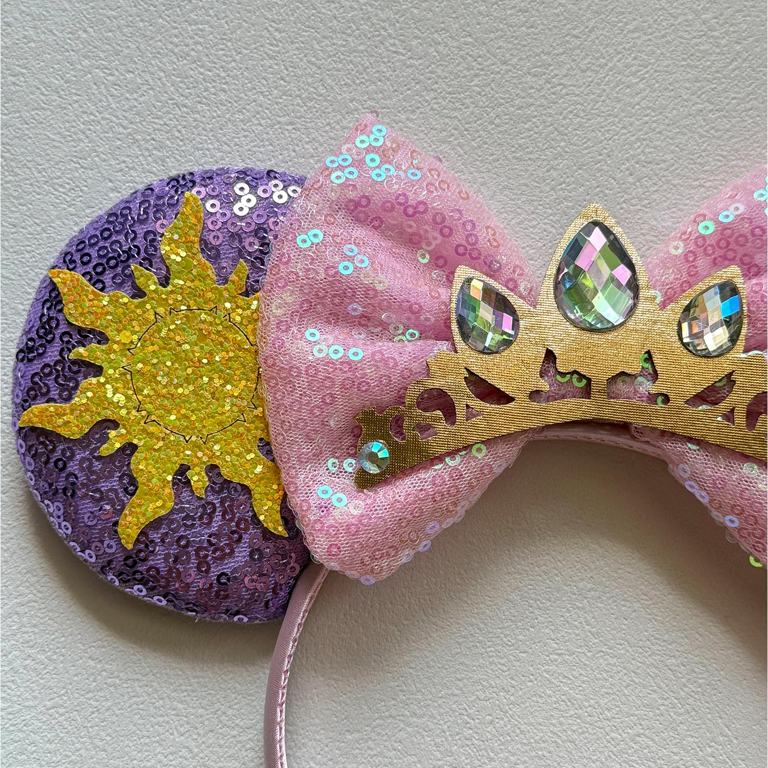 Bmobuo close-up of sequin crown detail, sparkly accent enhances look