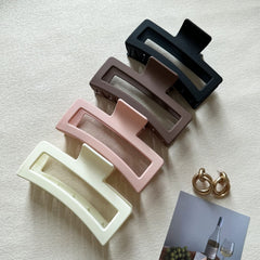 Bmobuo lifestyle image of bun and half-up look showing polished quick-styling benefit