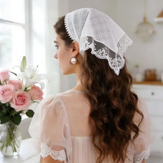 BOARDFEB close-up of hollow out floral lace pattern highlighting delicate vintage styling