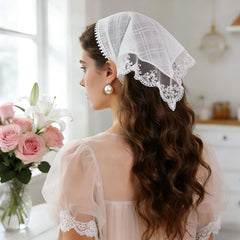 BOARDFEB close-up of hollow out floral lace pattern highlighting delicate vintage styling