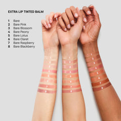 Bobbi Brown lifestyle application model applying balm for natural color and comfortable wear