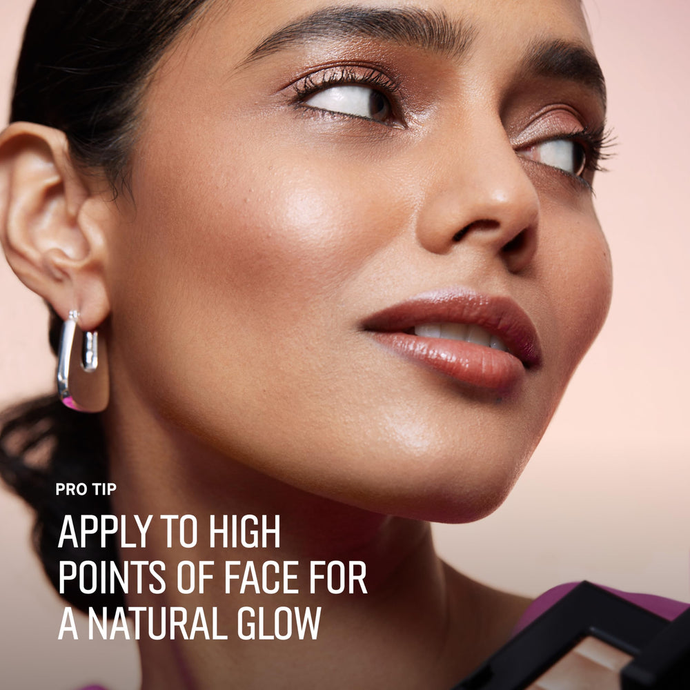 Bobbi Brown highlighter used as eyeshadow on lid for cohesive glowing eye look