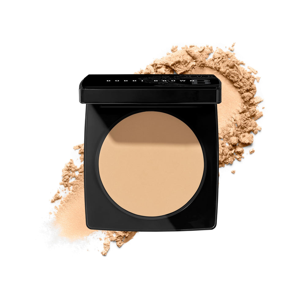 Bobbi Brown compact front showing shade Soft Sand and sleek case protecting powder