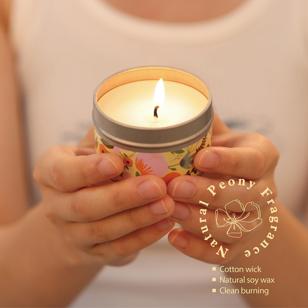 BODY & EARTH # LOVE scented candle lit in a cozy setting promoting relaxation