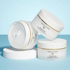 BODY FIRM ingredients flatlay with oils and shea butter highlighting nourishing benefit