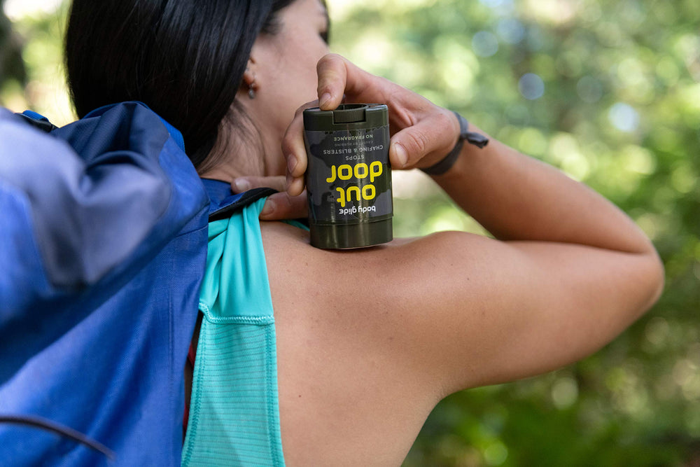 BodyGlide applied to runner's thighs preventing chafing during activity