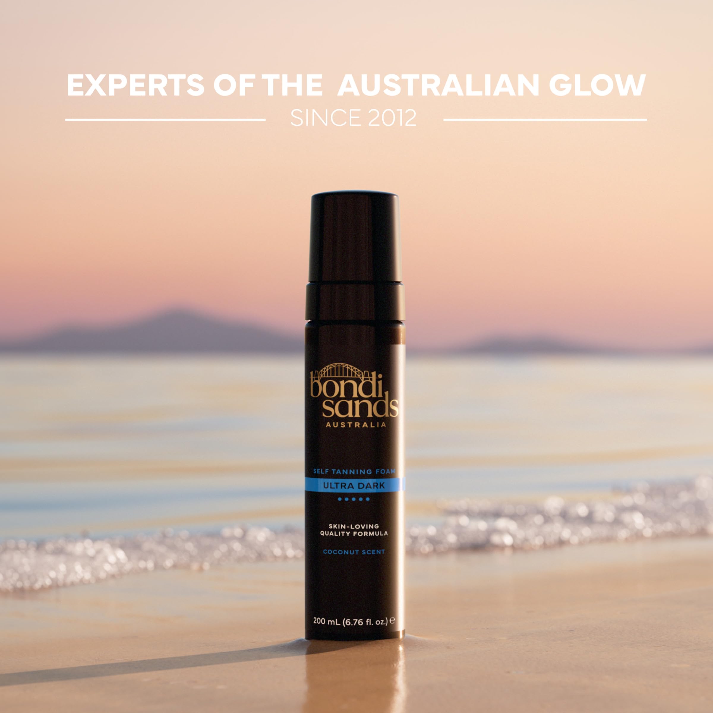 Bondi Sands foam and mitt staged in bathroom illustrating easy at-home tanning routine