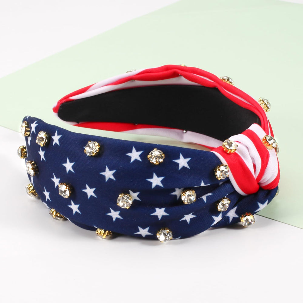 Bookay headband next to hand showing size and easy portability
