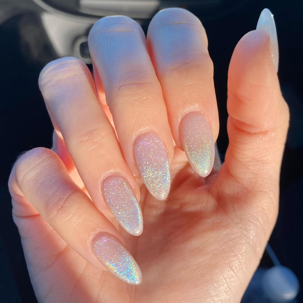 Born Pretty magnet held over wet polish demonstrating cat-eye effect creation