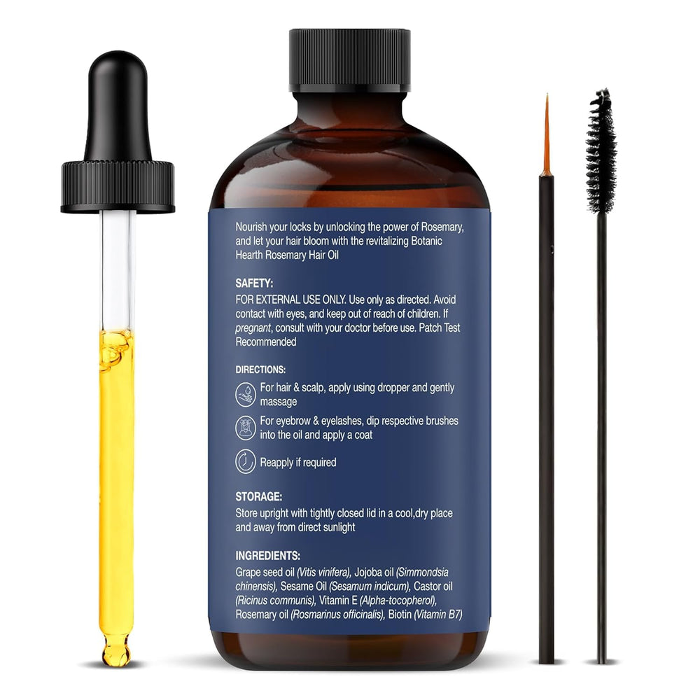 Botanic Hearth jojoba and castor oils beside rosemary showing nourishing, natural ingredients