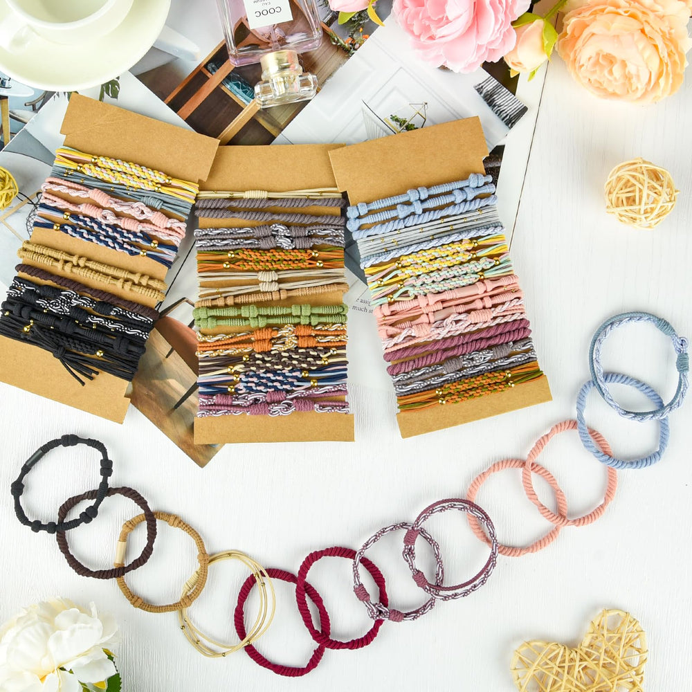 Bouiexye stacked hair ties worn as wrist bracelets, showing stylish accessory versatility
