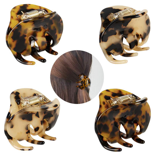 BOUNIQ front view of four leopard clips showing colors and pattern, stylish accessory