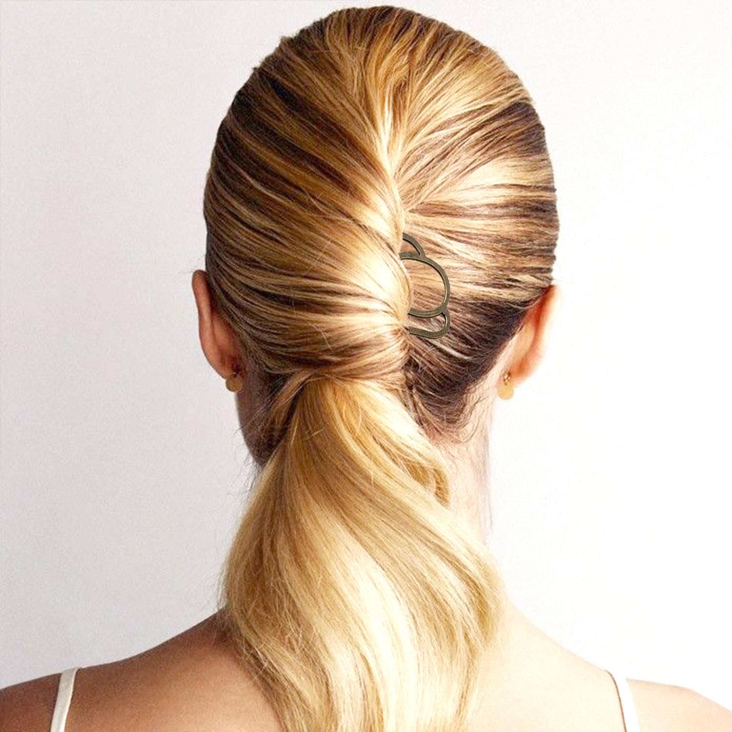BOYIVI close-up of four-prong tips showing smooth edges to protect hair