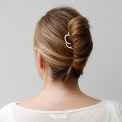 BOYIVI hair updo on model showing discreet support and elegant appearance