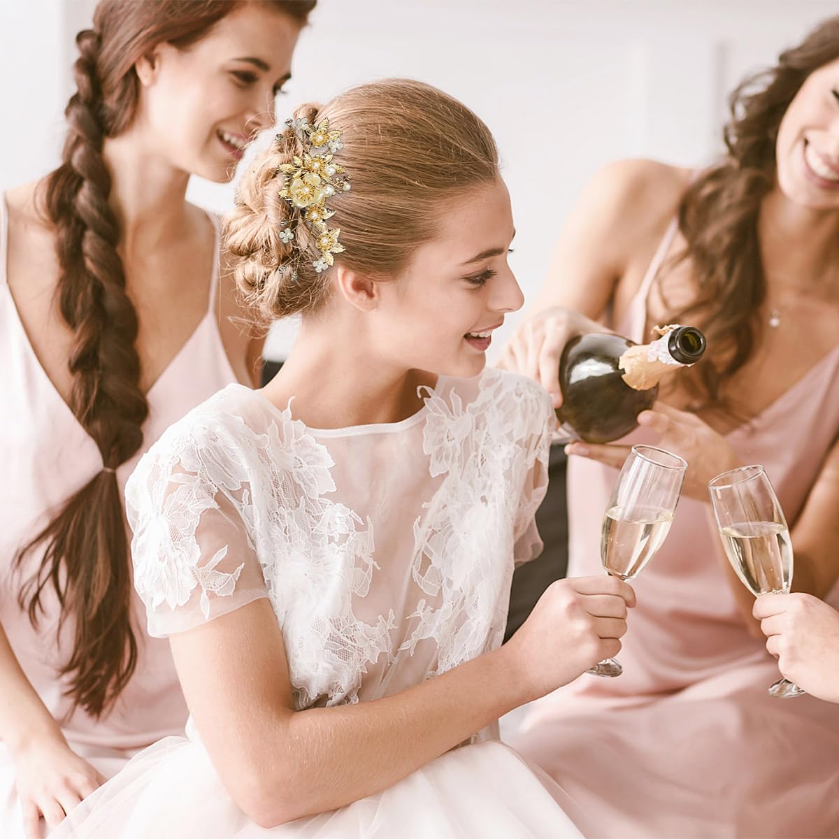 BOYIVI pins tucked in braid adding shimmer and floral touches
