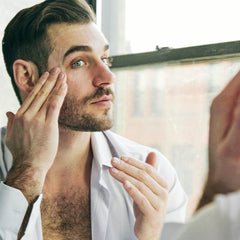 Brickell Men’s Products on a bathroom counter illustrating daily use in morning routine