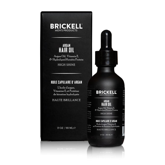 Brickell Men's Product dropper dispensing oil to control amount for styling