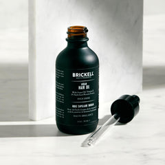 Brickell Men's Product clear argan oil texture demonstrating lightweight finish