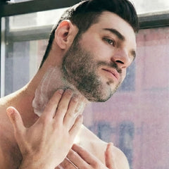 Brickell Men's Products being applied to jawline for firmer neck benefit