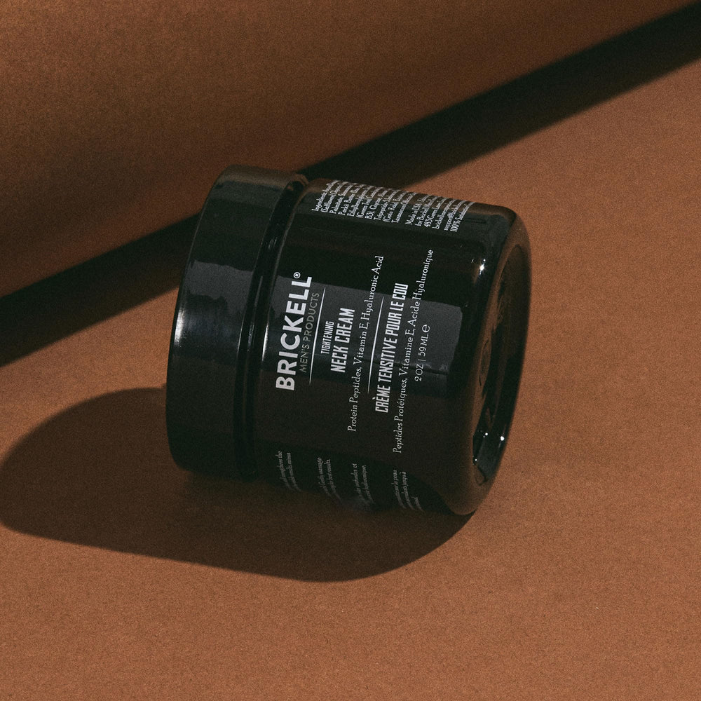 Brickell Men's Products on bathroom shelf in grooming routine inspiring consistent use