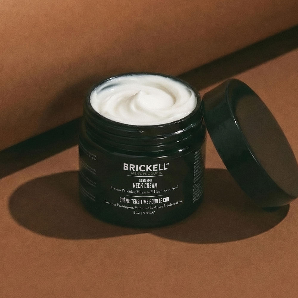 Brickell Men's Products 2 ounce tube next to common items showing compact size benefit