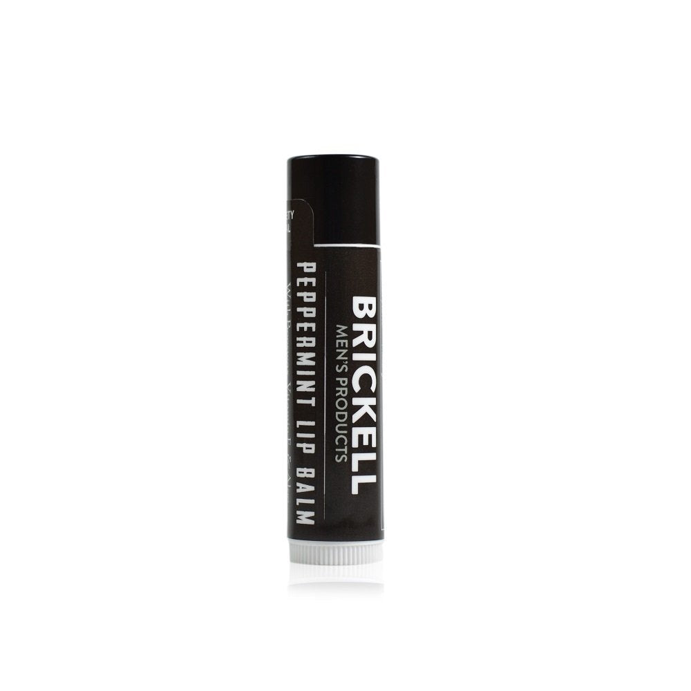 Brickell Men's lip balm front tube showing label and matte finish benefit