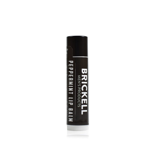 Brickell Men's lip balm front tube showing label and matte finish benefit