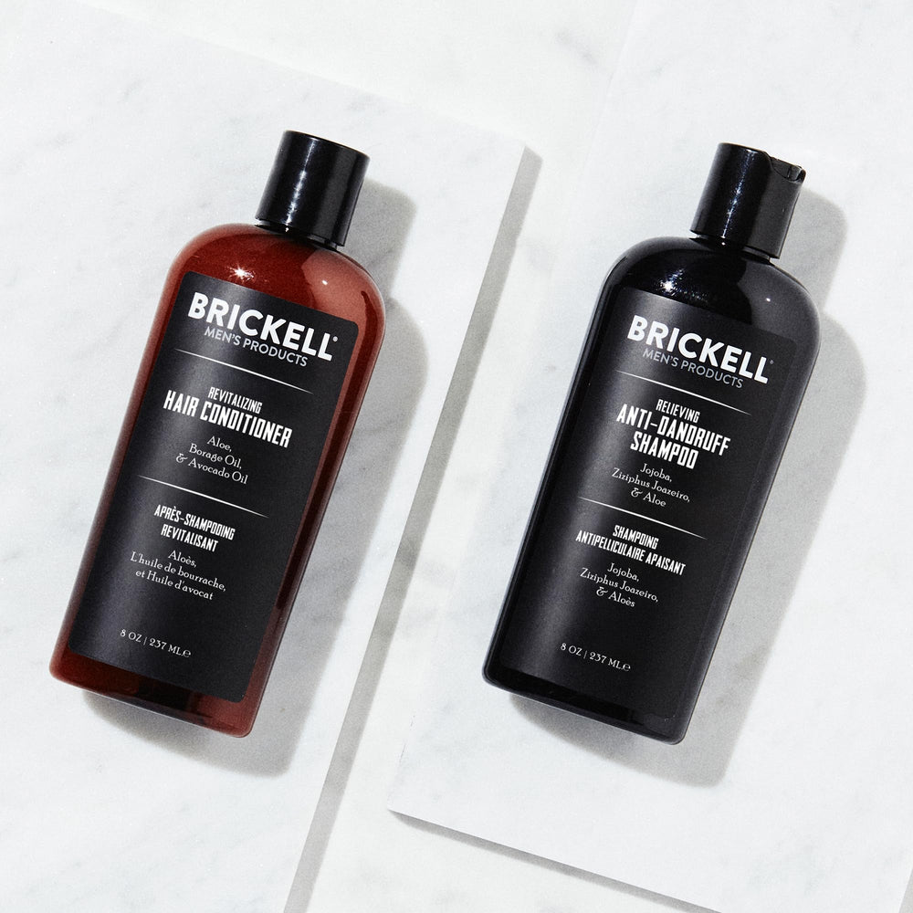 Brickell shampoo pump close-up showing foamy texture for effective cleansing