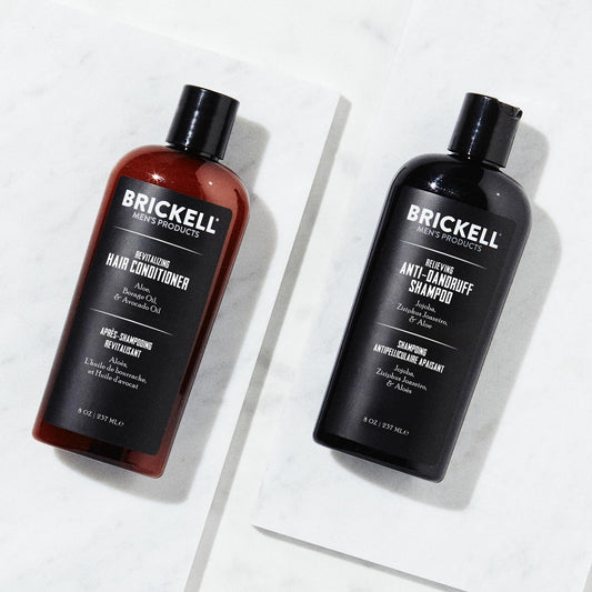 Brickell shampoo pump close-up showing foamy texture for effective cleansing