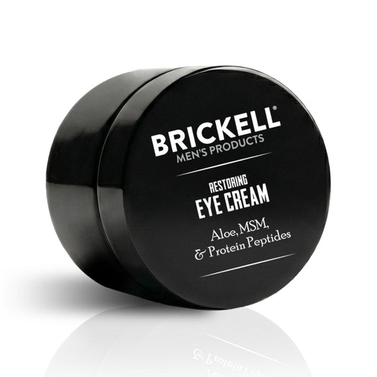 Brickell Men's front packaging showing 0.5oz unscented eye cream and clean design