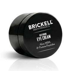 Brickell Men's front packaging showing 0.5oz unscented eye cream and clean design