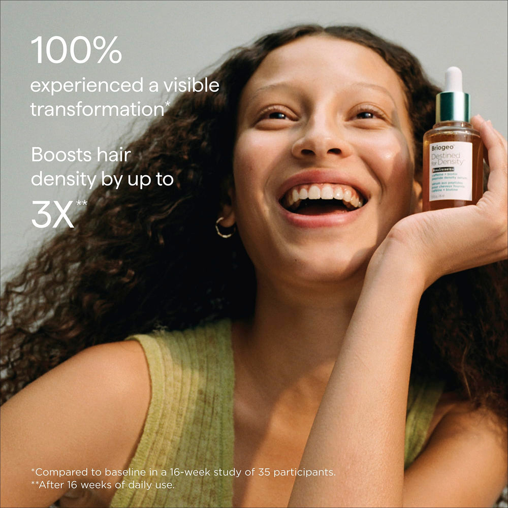 Applying Briogeo to scalp section to improve hair density