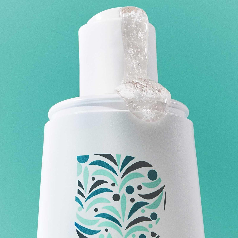 Briogeo caffeine ingredient shot emphasizing scalp-invigorating energy complex
