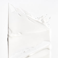 Briogeo conditioner texture close-up displaying slip and moisturizing feel