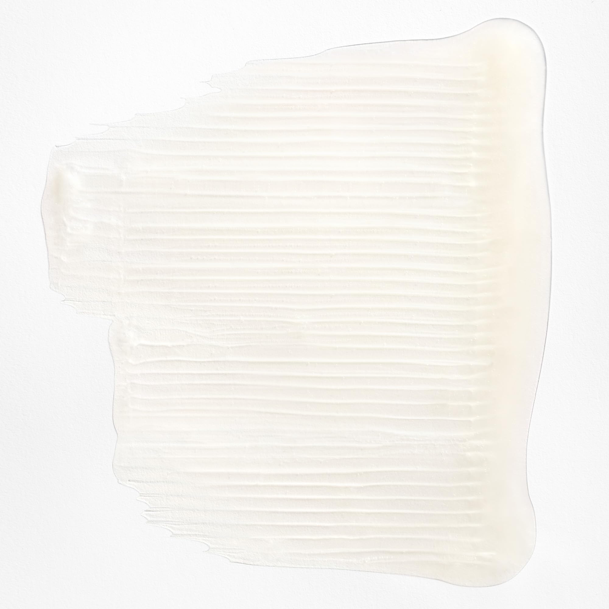 briogeo shampoo texture on hand demonstrating creamy lather and slip