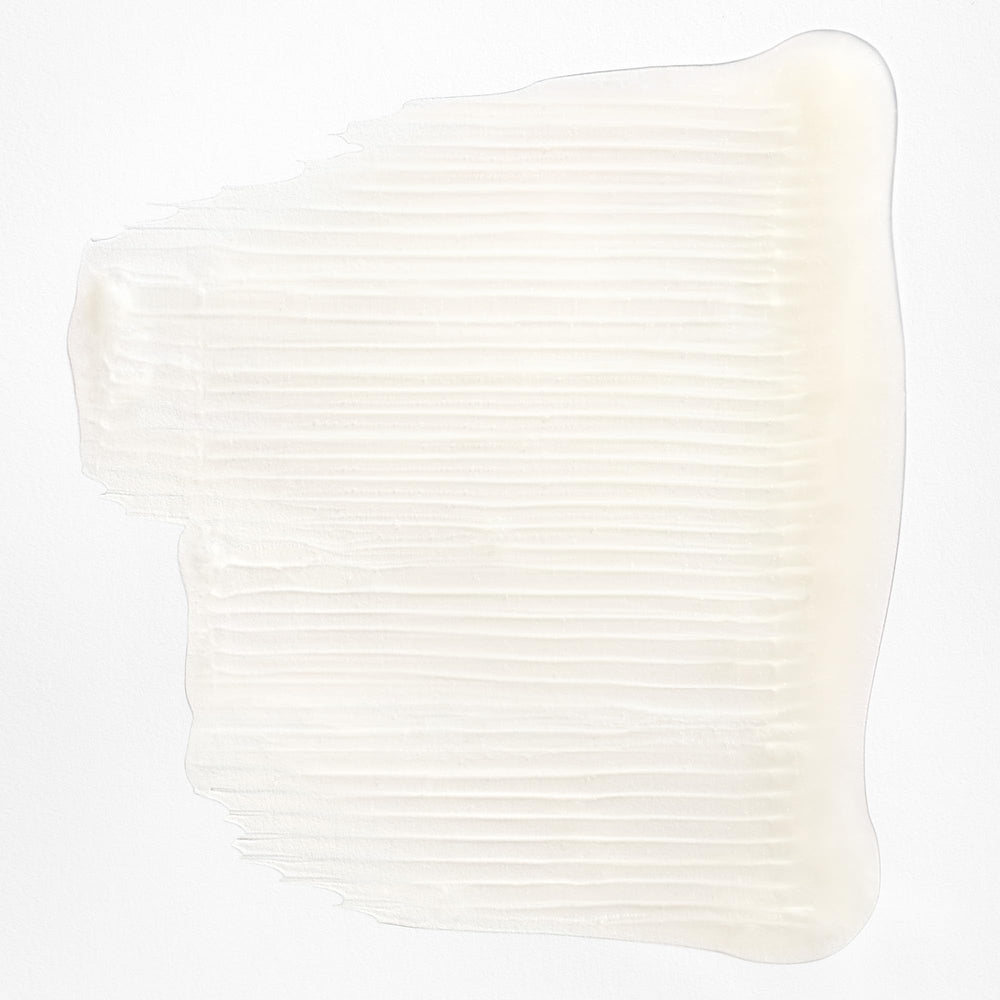briogeo shampoo texture on hand demonstrating creamy lather and slip