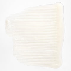 briogeo shampoo texture on hand demonstrating creamy lather and slip