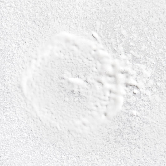 Briogeo spray nozzle close-up demonstrating easy mist application and control