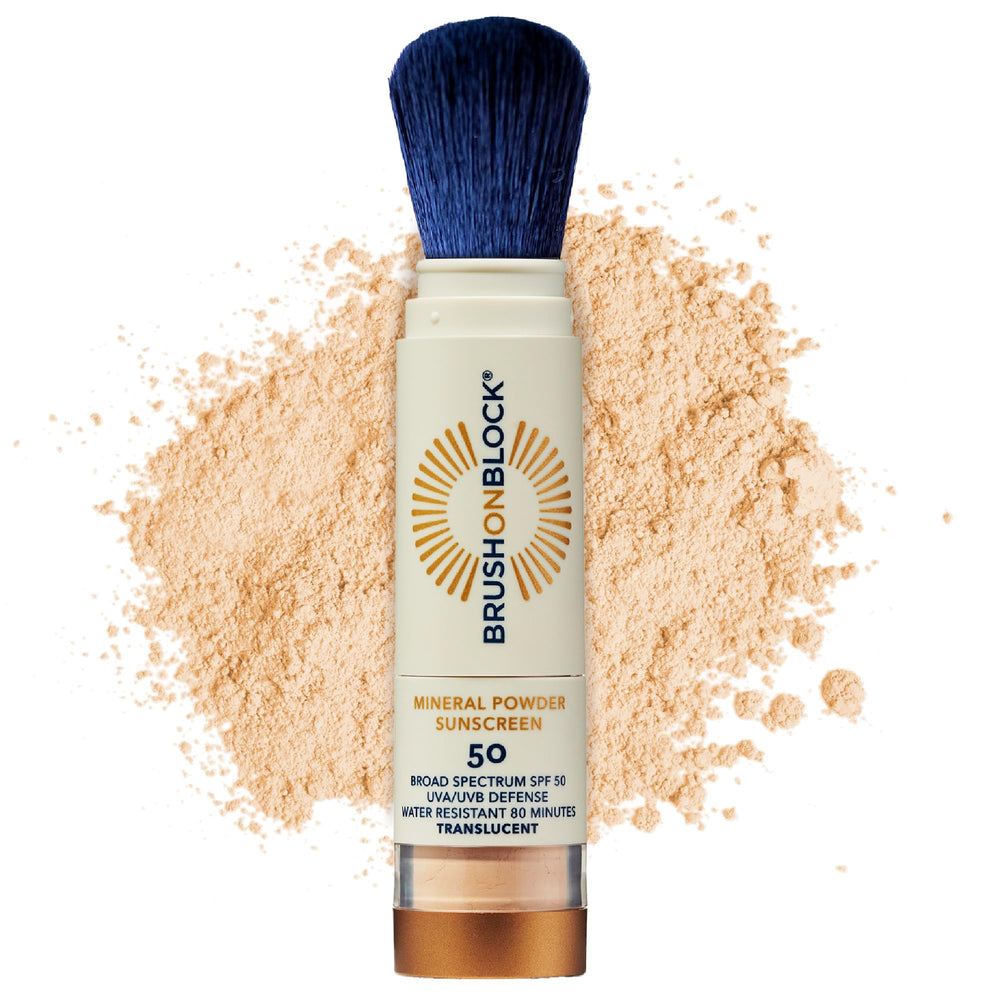 Brush On Block front compact showing closed brush and brand for portable SPF protection
