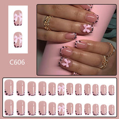 BSBTBZ pressing nail onto finger demonstrating easy at-home application
