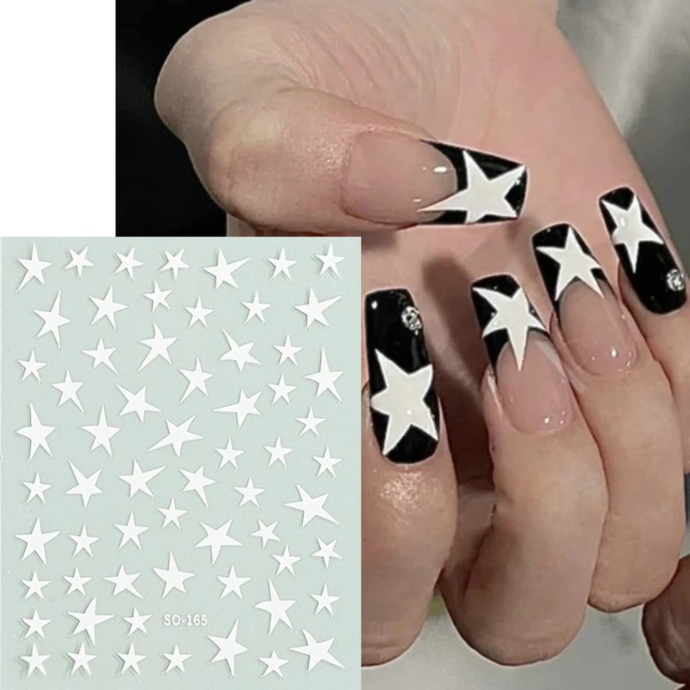BSBTBZ tweezers placing a star sticker on a nail for precise application