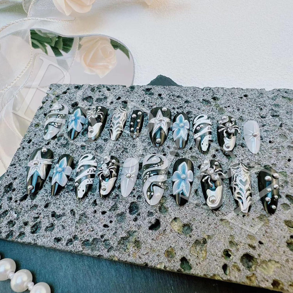 BSBTBZ close-up of 3D spider web rhinestone adding textured sparkle