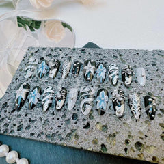 BSBTBZ close-up of 3D spider web rhinestone adding textured sparkle