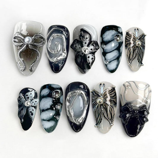 BSBTBZ front packaging showing 30 black almond press-on nails for instant glam